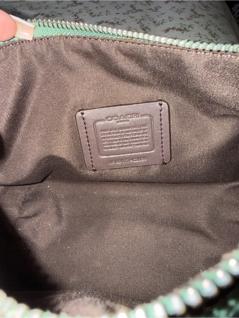 Coach Dempsey shoulder bag.